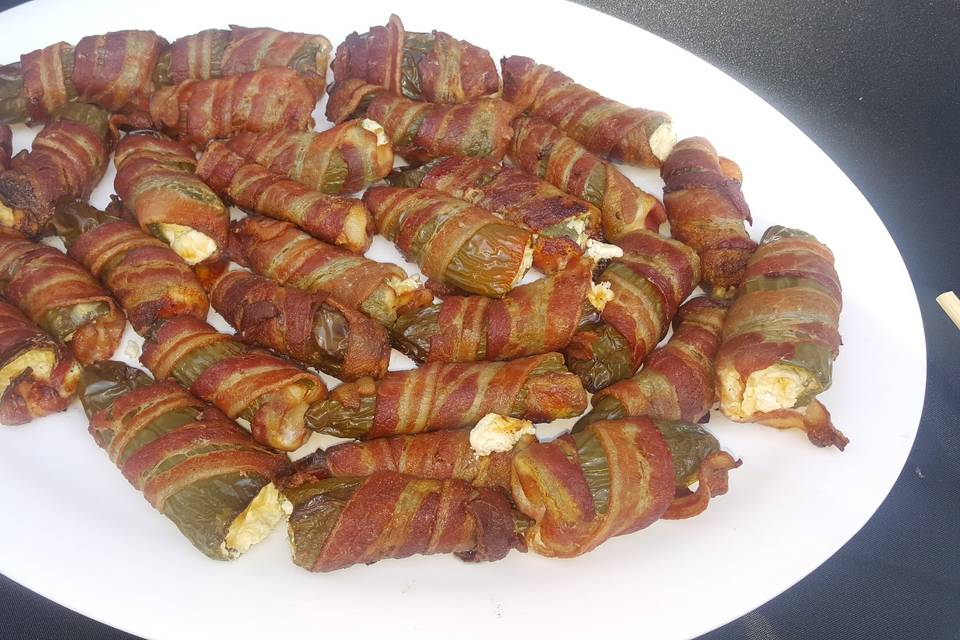 Stuffed jalapenos with cream cheese wrapped in bacon