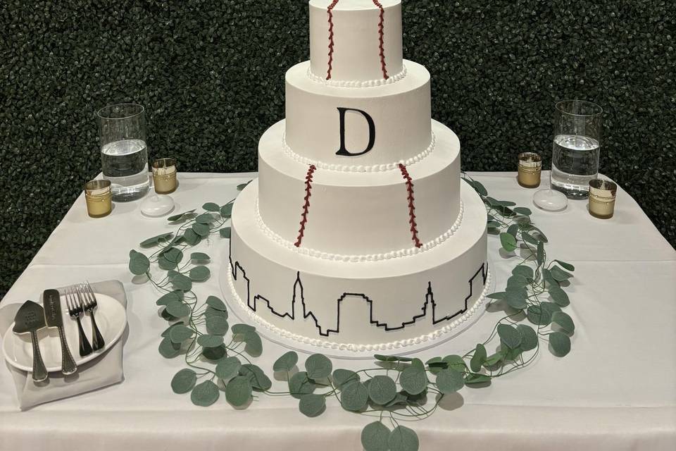 Cake & Greenery Wall Included!