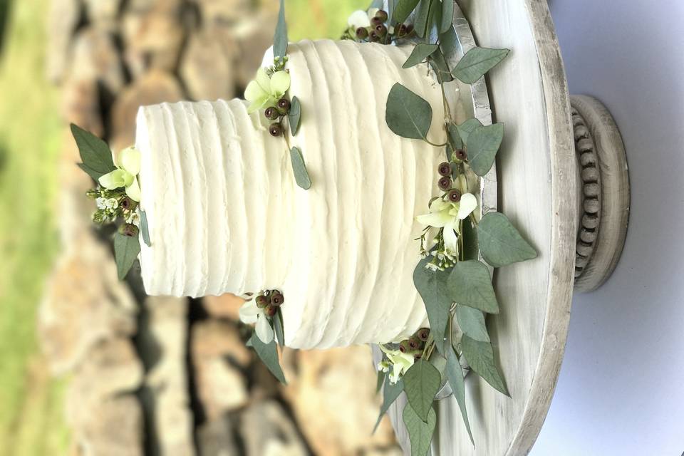 Rustic outdoor wedding.  Top tier carrot cake, bottom tier chocolate cake.