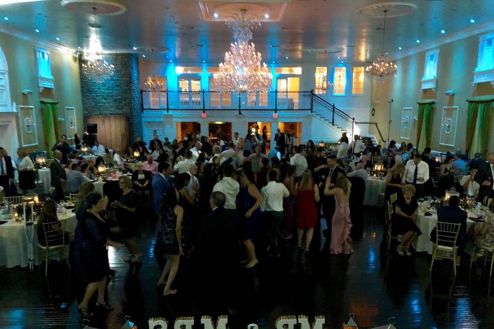 Bride and bridal party dancing