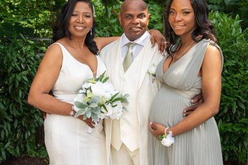 Bride, Groom, and Daughter