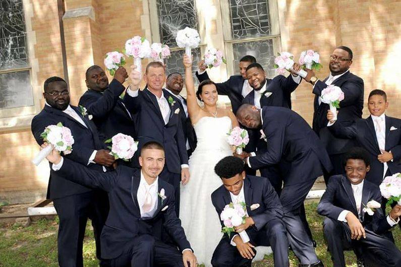 Couple with groomsmen