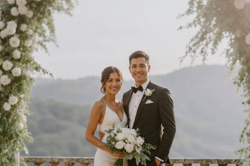 Bridge and Groom on Balcony