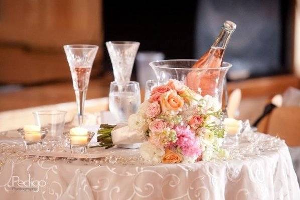 Bouquet and Champagne bottle with glasses