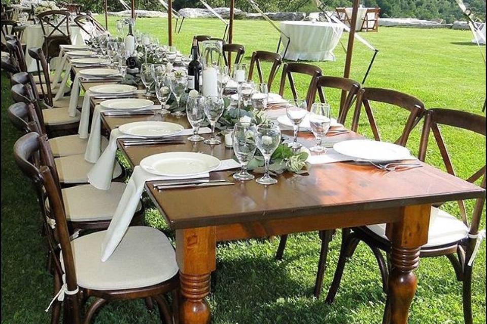 Farm tables with turned legs!! Crossback chairs and a beautiful setting! This is the best of the best under our sail cloth.