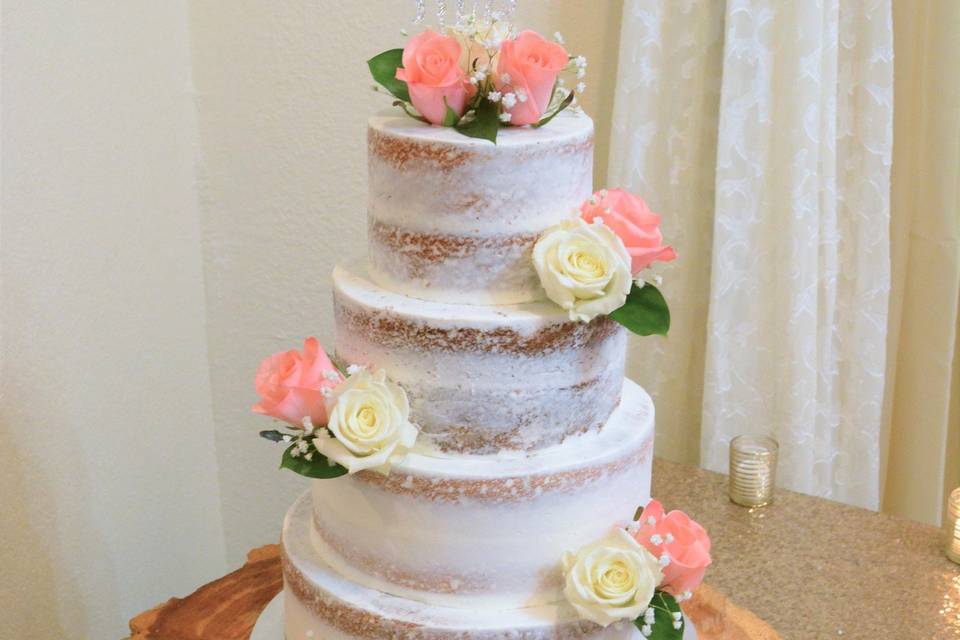 Rustic semi naked cake with fresh roses