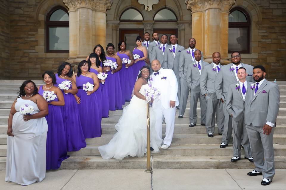 The couple with the bridesmaids and groomsmen