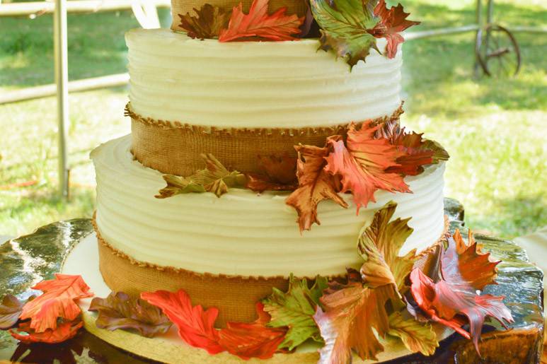 Textured buttercream with edible burlap and handmade leaves