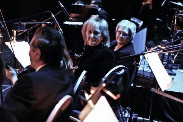 On Stage at the Stafford Center with Country Music Legend, Mr. Ray Price and members of the Ft. Bend Symphony Orchestra.