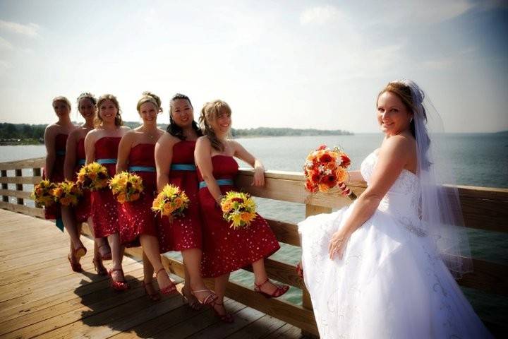 Bridesmaids with the bride on the boardwalk