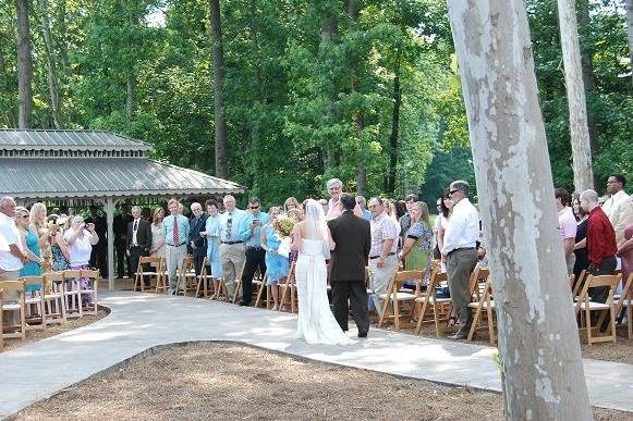 Beautiful outdoor arbor on the river for ceremonies.