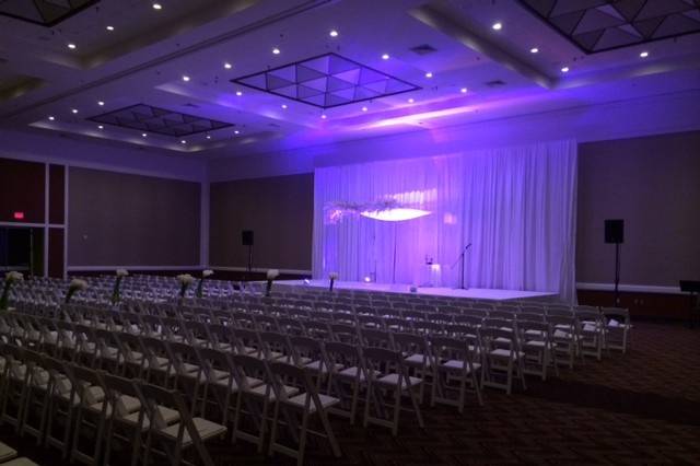 Ceremony setup with purple lighting