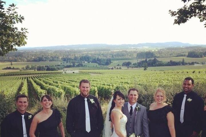 The couple with their bridesmaids and groomsmen