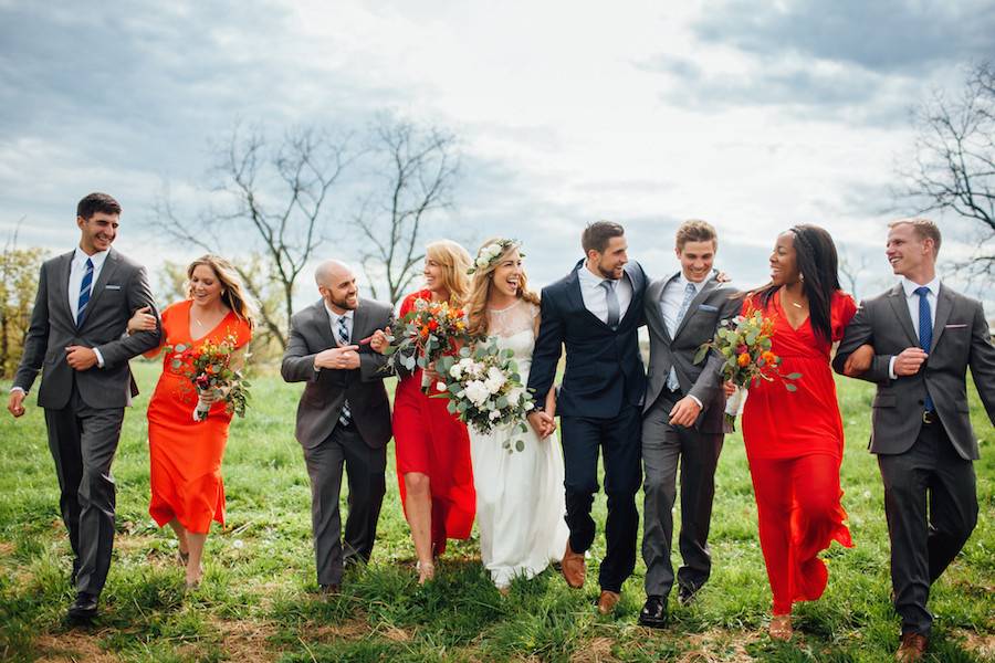 The couple with the bridesmaids and groomsmen