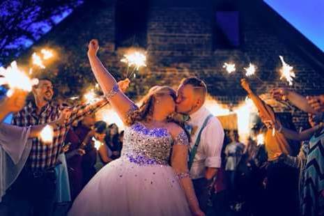 Newlywed couple sparkler exit