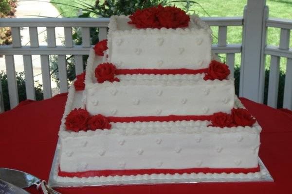 Christine's 2011 Graduation CakeAlmond Cake Bottom Tier, Chocolate Cake Middle Tier and Strawberry Cake w/Fresh Strawberries Top Tier