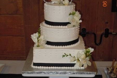 Jana and Brian's Wedding CakeStrawberry cake w/fresh strawberries and white chocolate buttercream