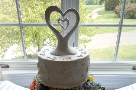 Keilyn & Robert's Wedding Cake on the Nina's Dandy in Alexandria, VA 9/10/113-tier - Marble w/buttercream, White w/Chocolate Ganache covered in fondant and Marble w/buttercream