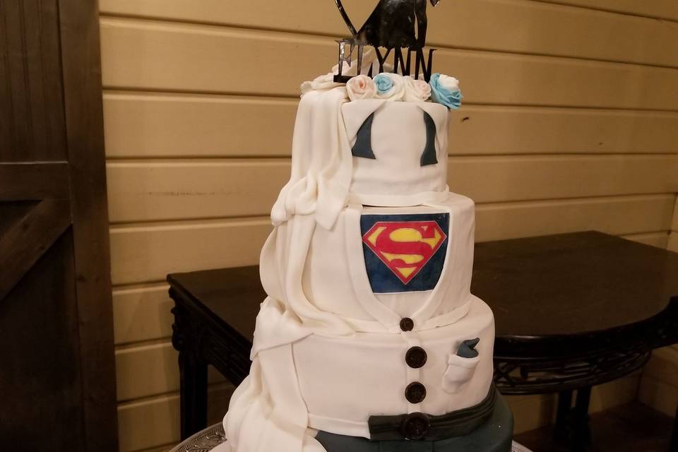 Superman/ draped cake with scrollwork