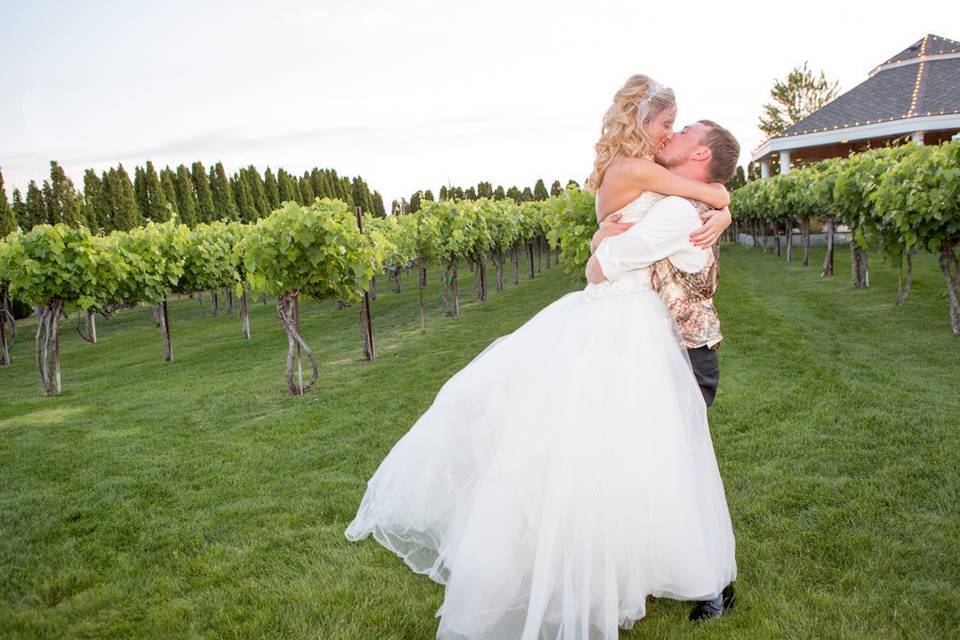 Happy couple in the vineyard