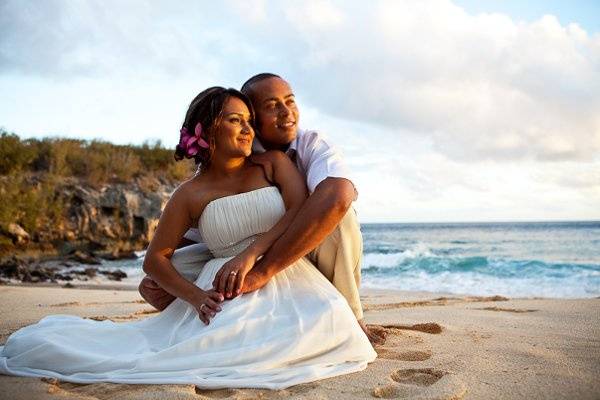 Groom and bride on the sand