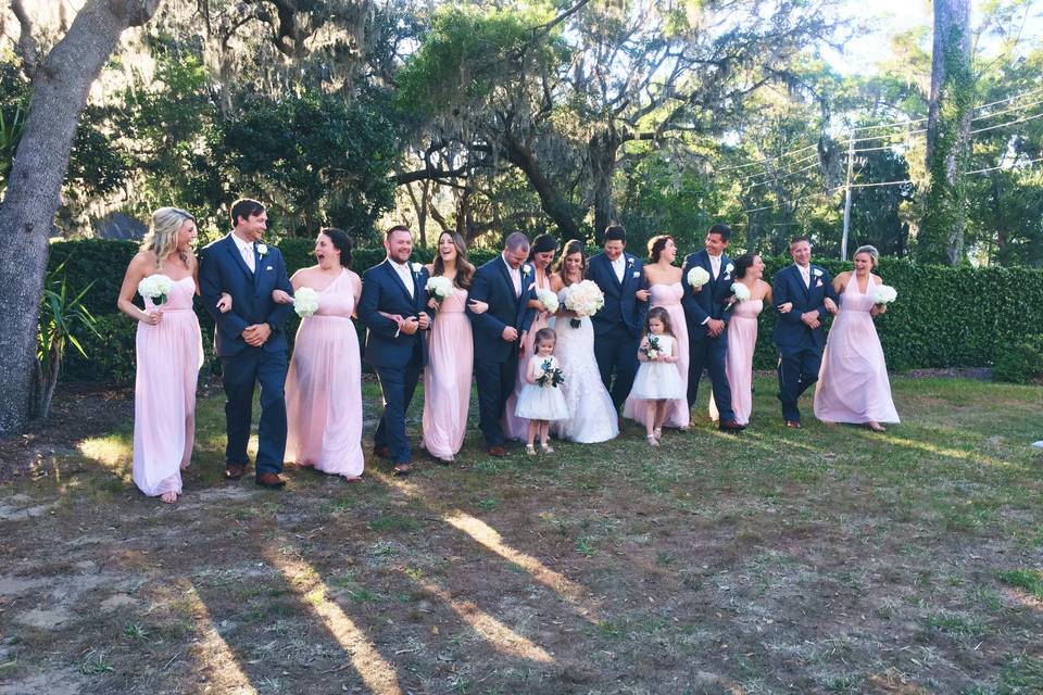 With the bridesmaids and groomsmen
