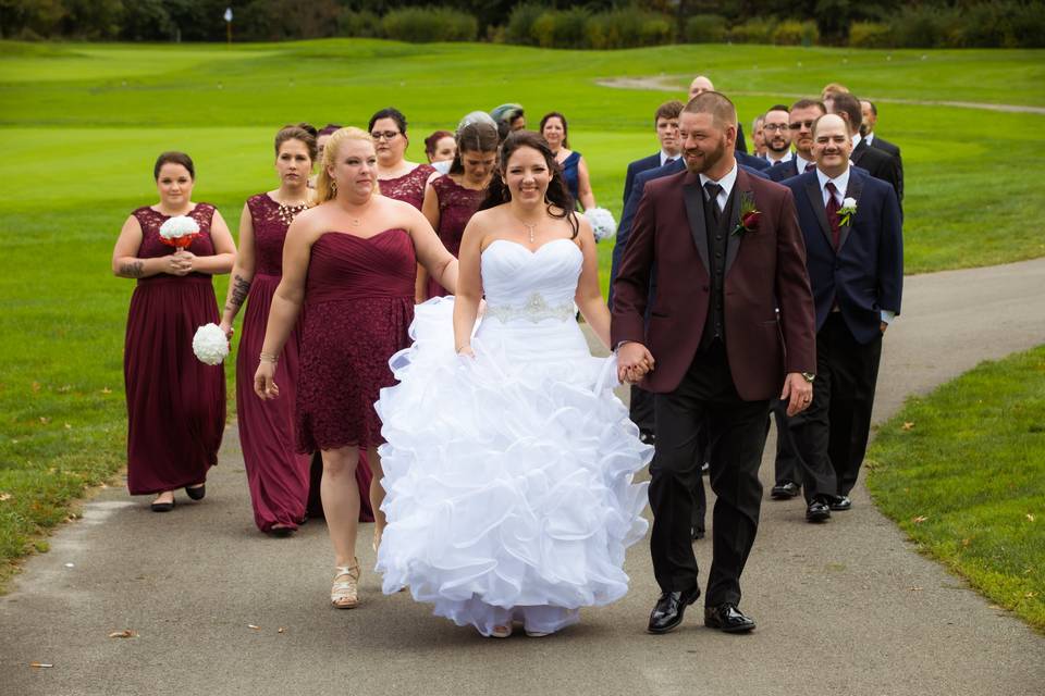 Newlyweds and their wedding party