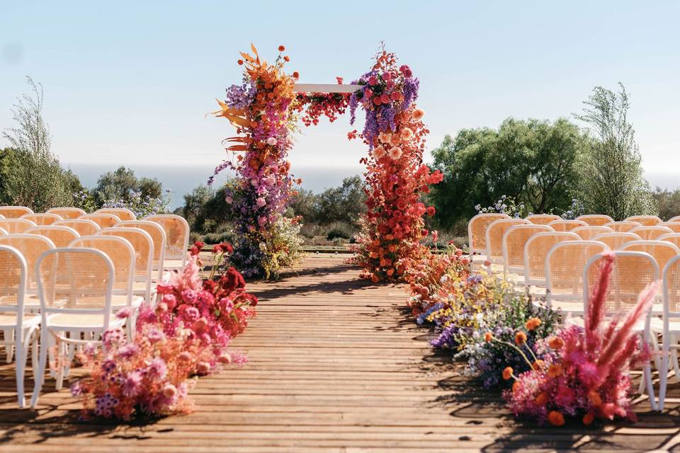 Rainbow floral arch