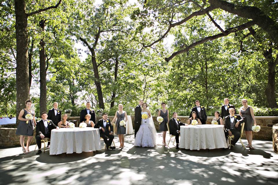 The couple with the bridesmaids and groomsmen