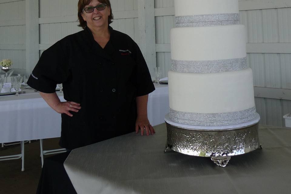 100% fondant covered and 4 1/2 feet tall above the table