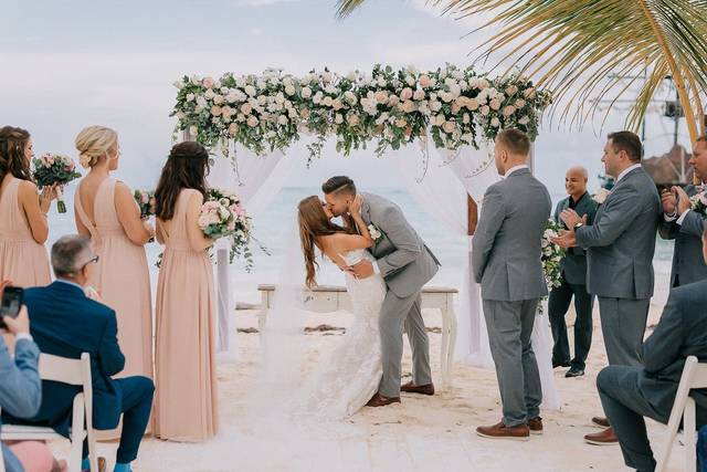 Kiss under the floral arch