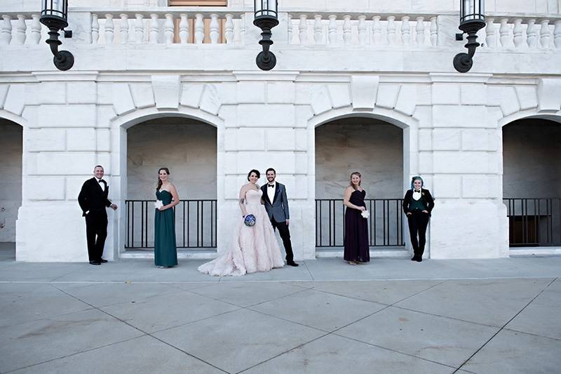 The newlyweds and wedding attendants