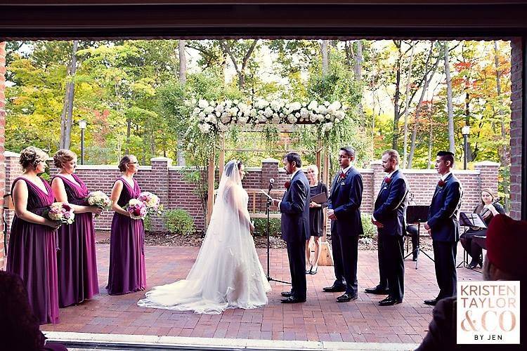 The newlyweds with the wedding attendants