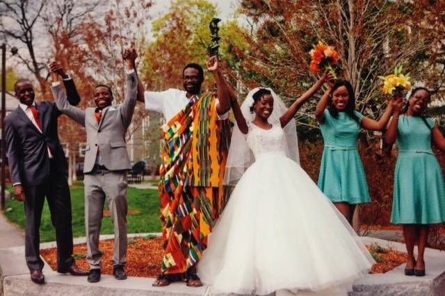 The couple with the bridesmaids and groomsmen