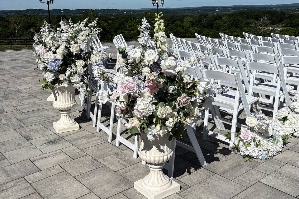 Large Urns at Back of Aisle