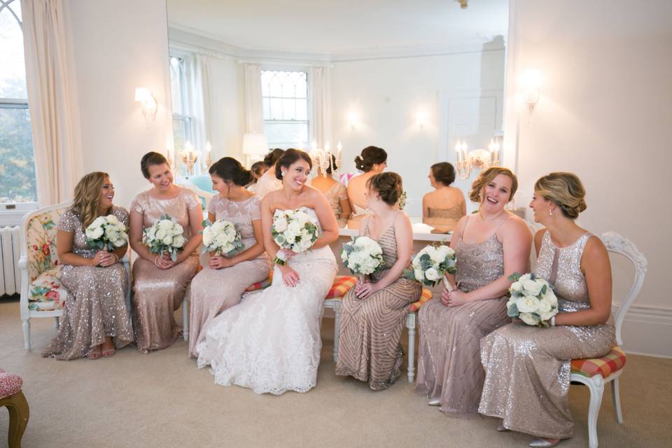 Bride and her bridesmaids in the suite