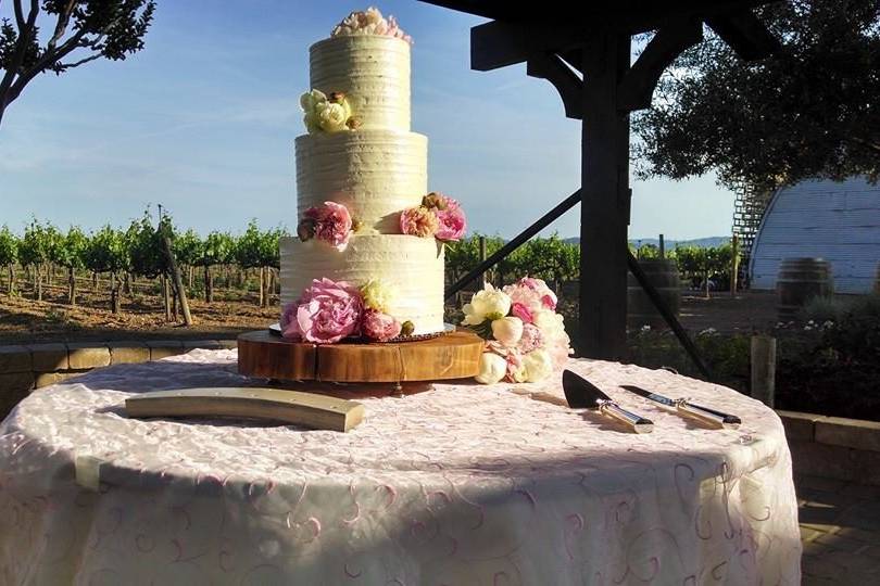 Outdoor wedding cake setup