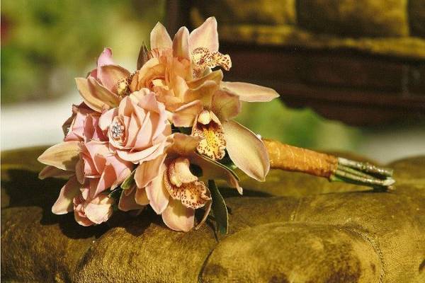 Gorgeous hand tied amber toned orchids.