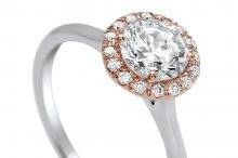 Timeless Designs halo style engagement ring with Rose gold and white gold.