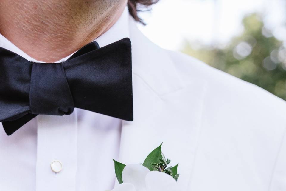 Elegant Orchid Boutonniere