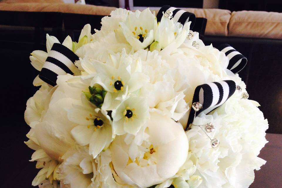 Black and white bouquet with ribbon accents