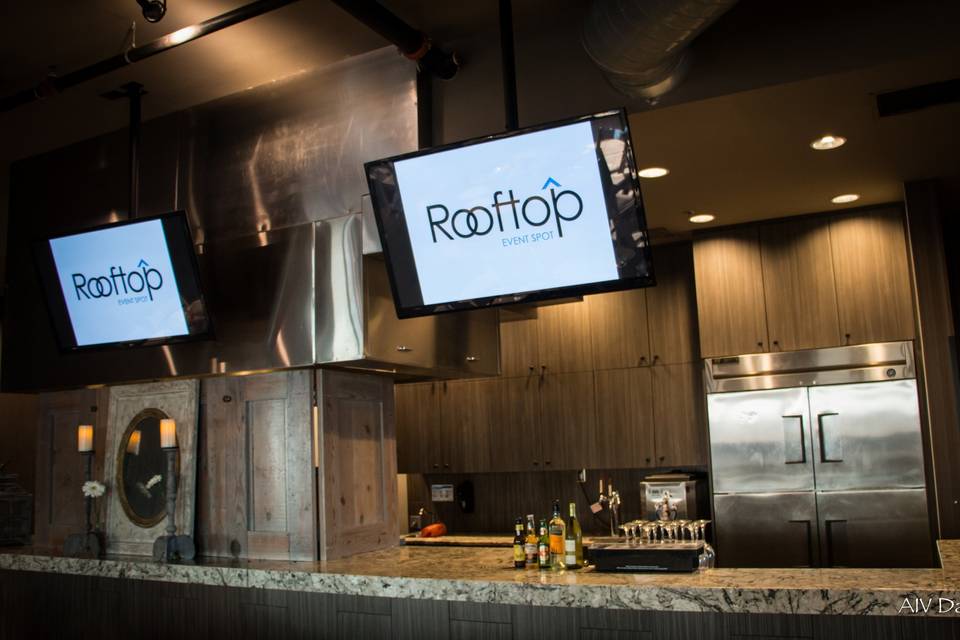 Two of our six flat-screen TVs are situated over the bar area. Catering food and beverage is provided exclusively by Urban Crust and Urban Rio, two local, award-winning Plano restaurants.