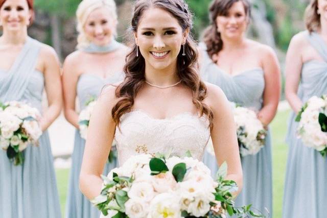 Beautiful bride with bridesmaids