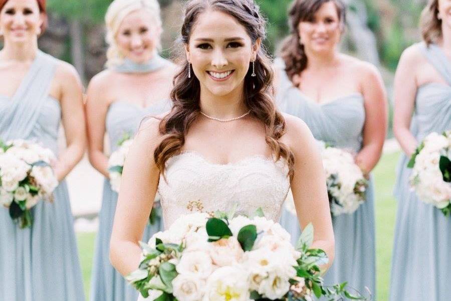 Beautiful bride with bridesmaids