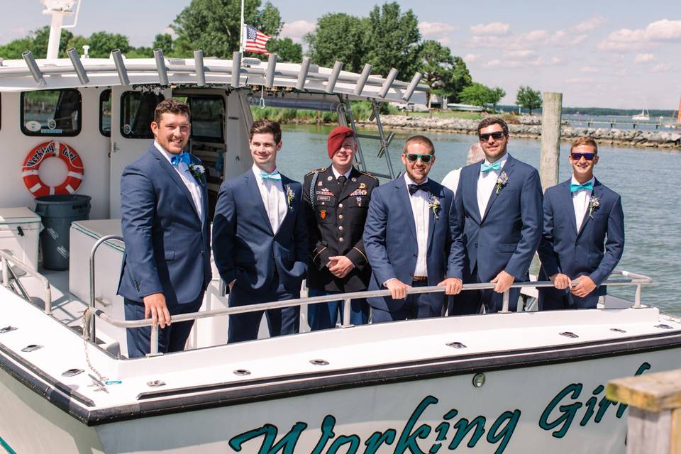 Groomsmen on boat