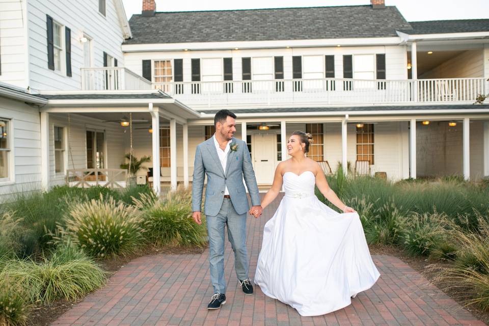 Liv and greg front of hotel