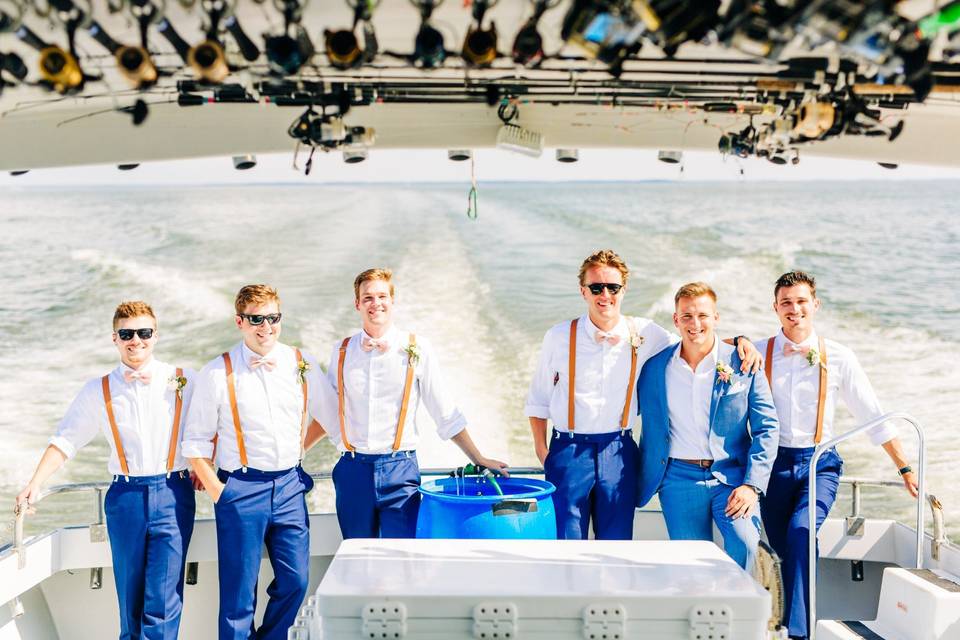 Groomsmen arrive via boat