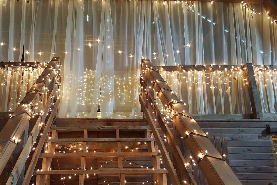 Stairs decorated in string lights