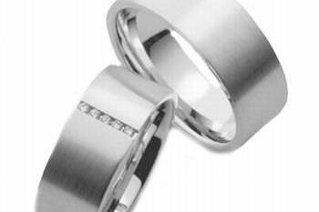 This his and hers 14k white gold wide wedding band has a flat surface with sandstone finish and smooth and silky inside for a comfort fit wear. Her wedding band sets with 5 round diamonds total weight of approximately 0.15 carats.  Available in any size and width.