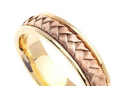 This 14k two tone dome surface, wedding band features five rows of alternating finishes